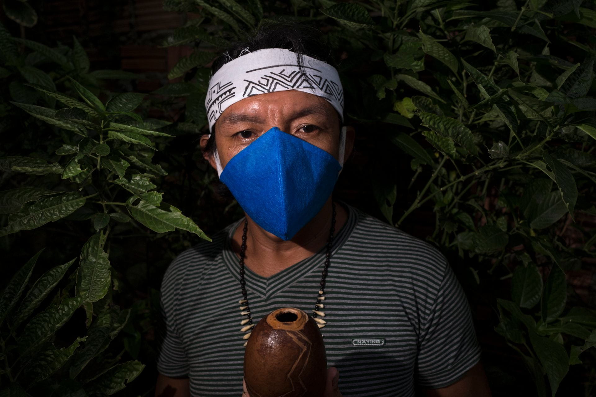 masked indigenous shaman