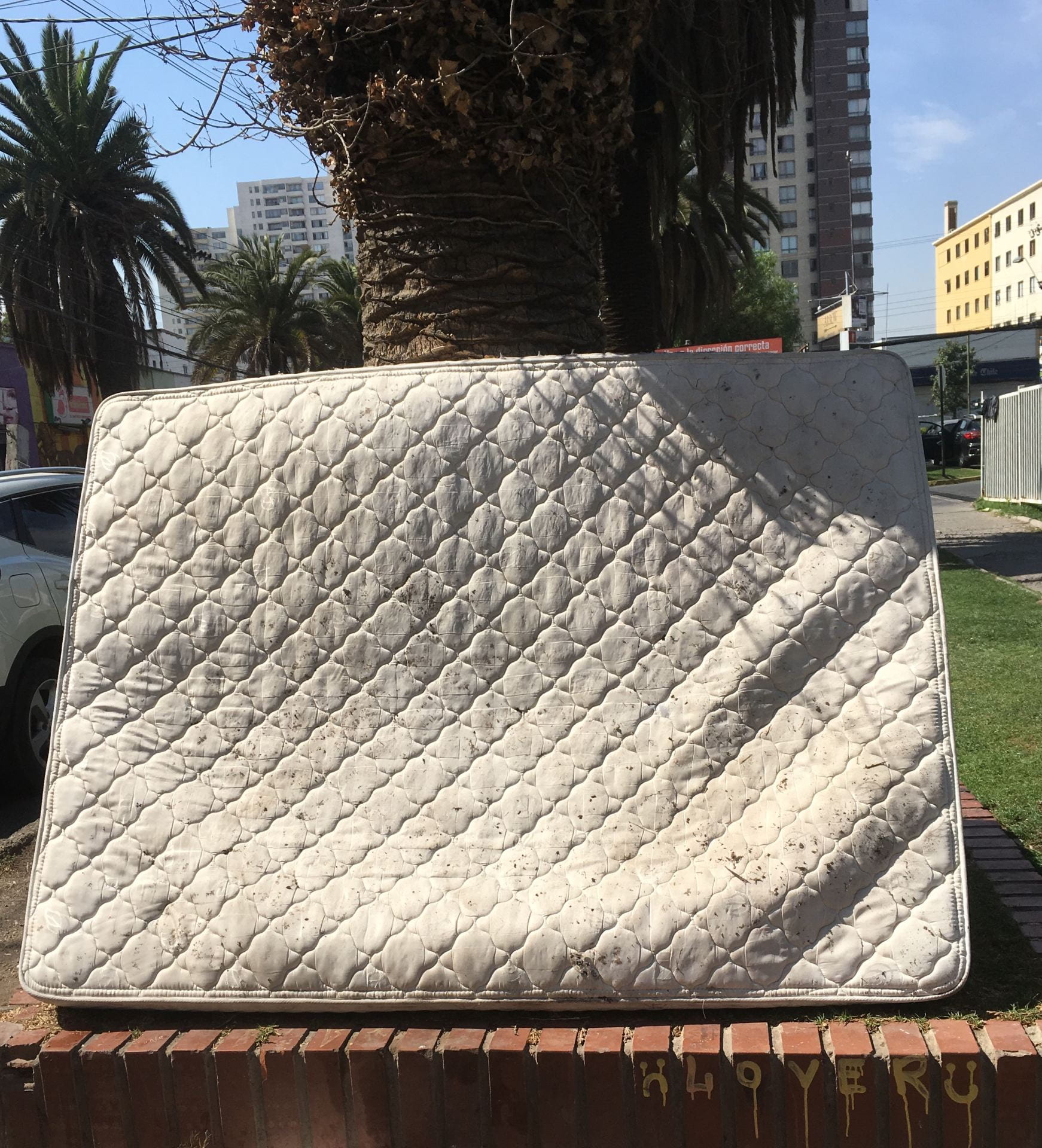abandoned mattress in the street