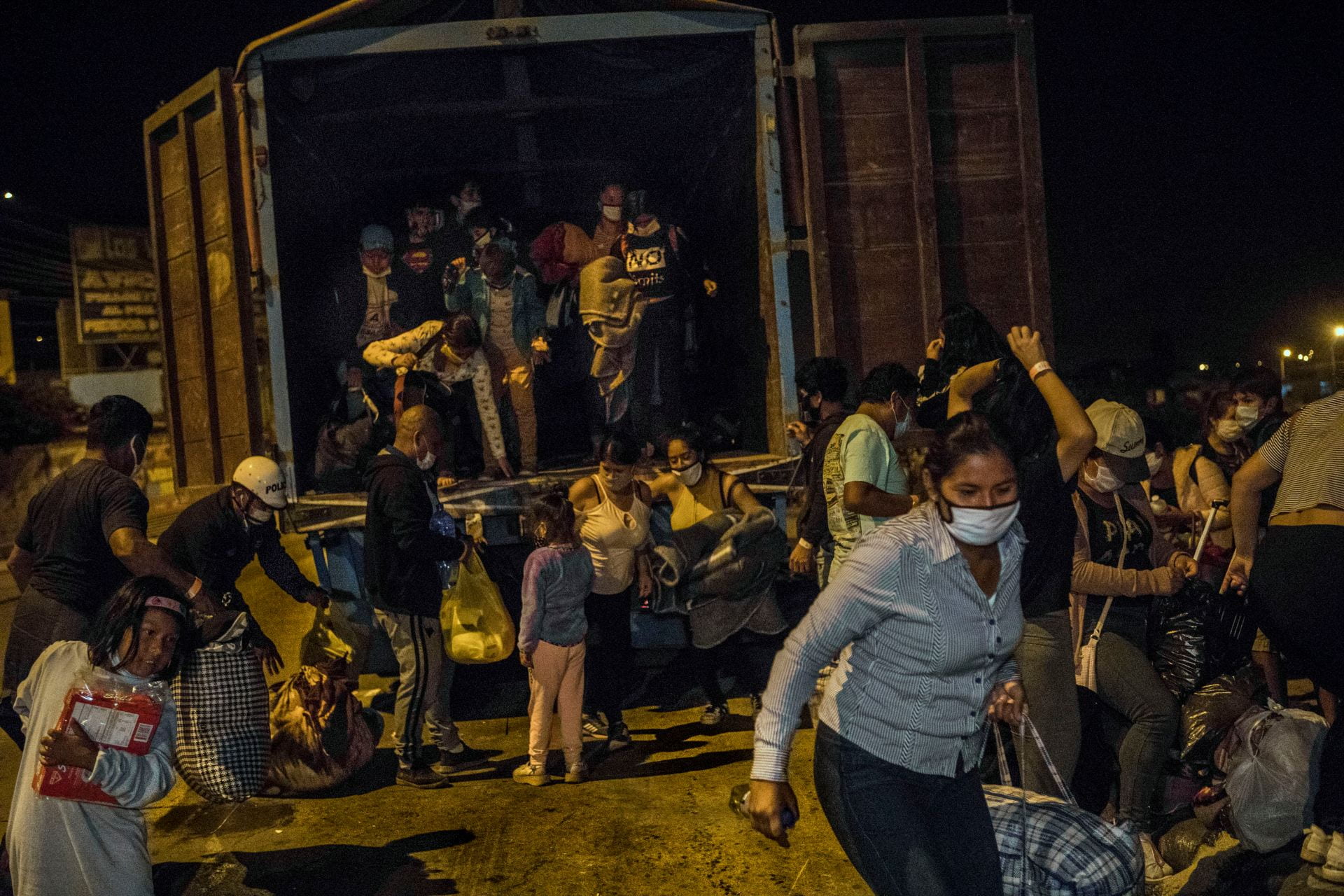 People fleeing Covid in container truck