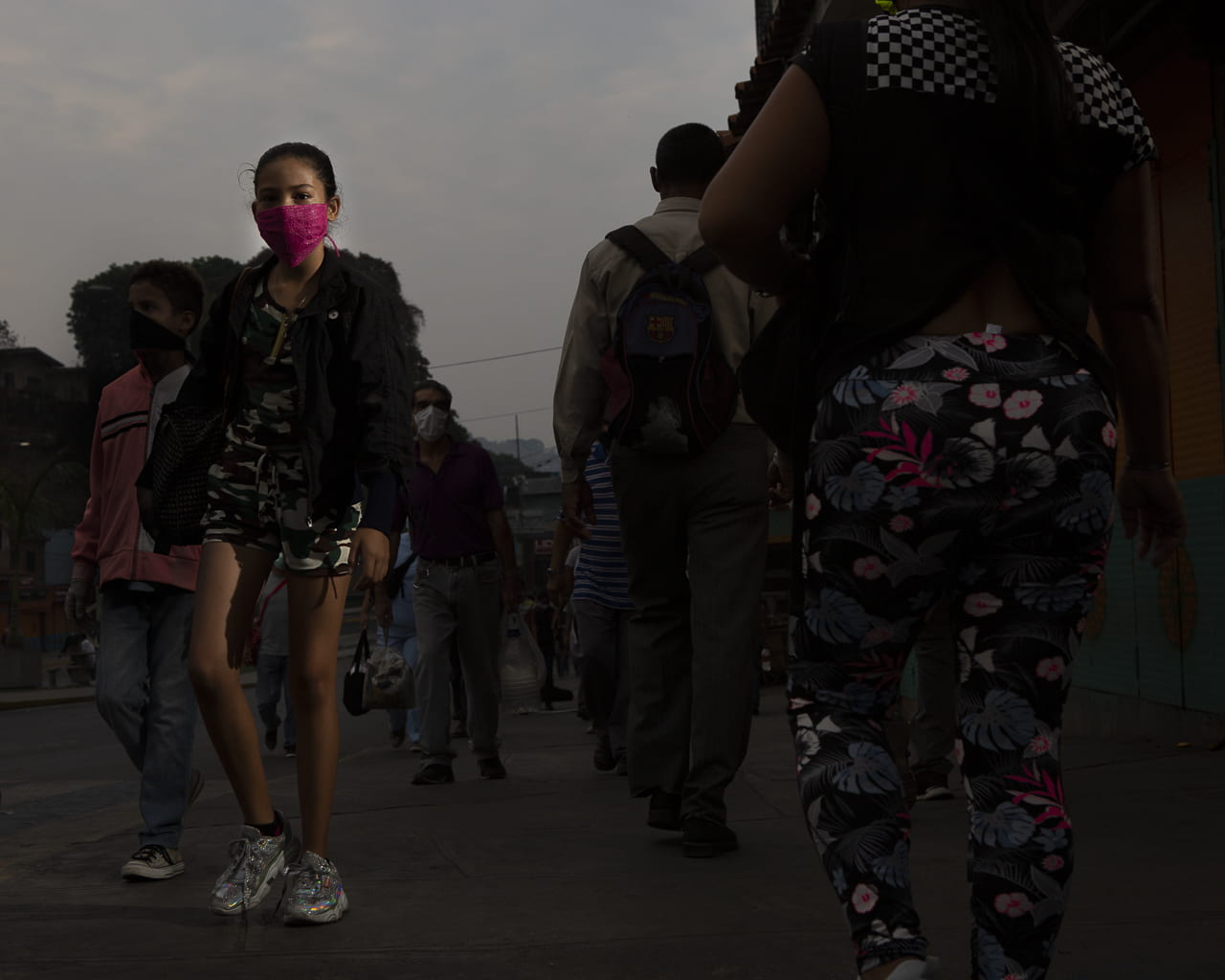 masked girl walking