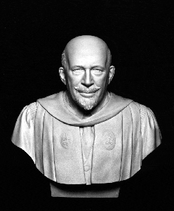Bust statue of an older man wearing a robe